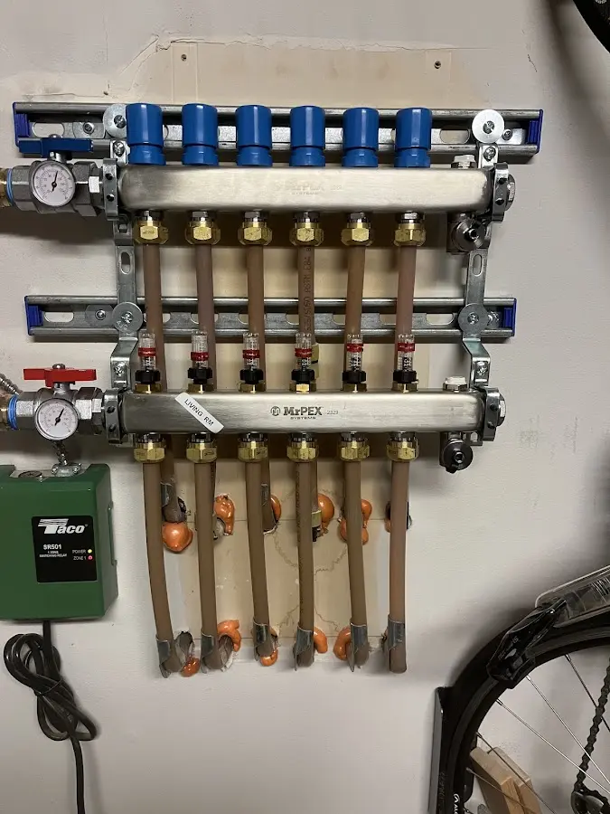 Plumber performing Water Heater Repair at a residential property in Middleton